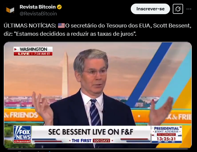 A imagem mostra uma captura de tela de uma publicação da Revista Bitcoin no Twitter. O texto da publicação diz: "ÚLTIMAS NOTÍCIAS: O secretário do Tesouro dos EUA, Scott Bessent, diz: 'Estamos decididos a reduzir as taxas de juros'. WASHINGTON". Abaixo do texto, há uma imagem de um vídeo ao vivo do programa "Fox & Friends" com a legenda "SEC BESSENT LIVE ON F&F" e uma barra de progresso indicando que o vídeo está em andamento. No canto inferior direito, há um ícone de relógio mostrando o horário "13:25:31". A imagem também inclui elementos gráficos típicos de uma interface de rede social, como botões de interação e informações de perfil.